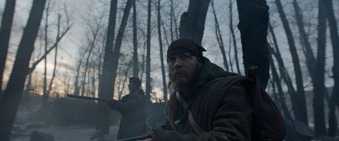 re_select_4.00002444 Tom Hardy (foreground) and Will Poulter hunt for the person they had left for dead, in THE REVENANT. Photo Credit: Courtesy Twentieth Century Fox. Copyright © 2015 Twentieth Century Fox Film Corporation. All rights reserved. THE REVENANT Motion Picture Copyright © 2015 Regency Entertainment (USA), Inc. and Monarchy Enterprises S.a.r.l. All rights reserved. Not for sale or duplication.